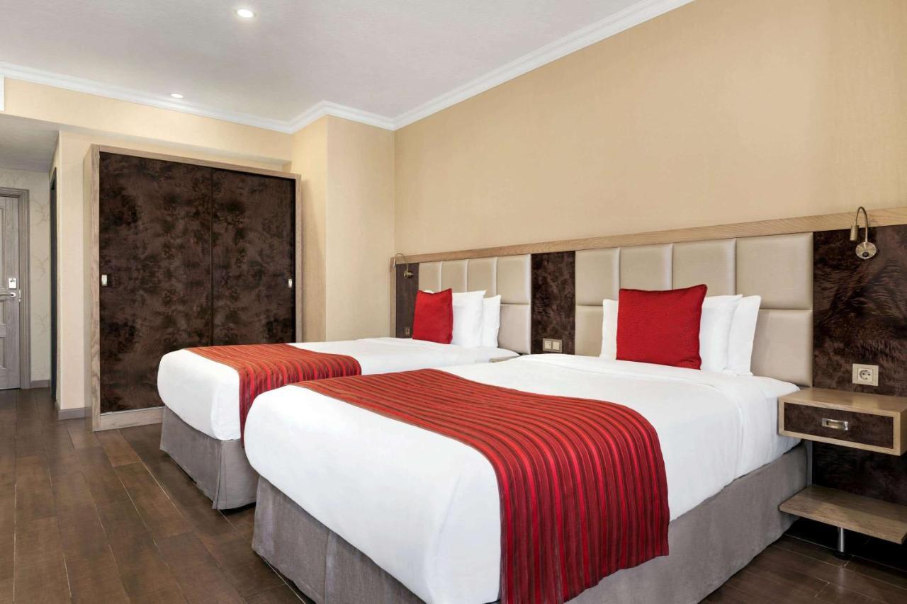Ramada By Wyndham Bishkek Centre Exterior foto